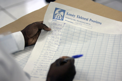 Electoral Polling Supervisor Trainee Learning to Tally Ballots