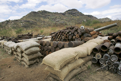 A Stockpile of Disposed Unexploded Ordinances