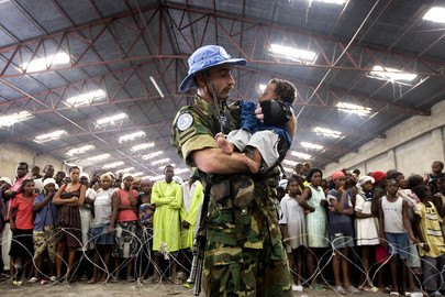 MINUSTAH Military Personnel Assists Flood Victims