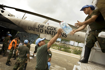 MINUSTAH Distributes Water Supplies for Flood Victims