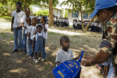 MINUSTAH Peacekeepers Distribute School Supplies to Children 