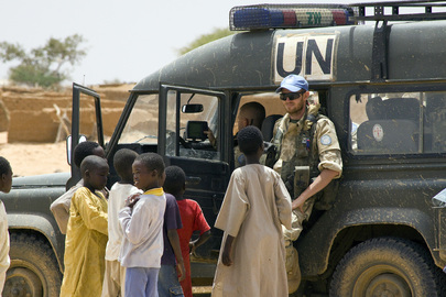 Peacekeeper with Sudanese Refugee Children