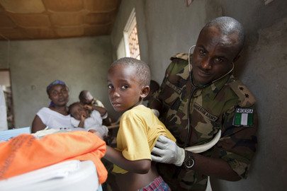 Nigerian Peacekeeper Gives Check-ups to Children in Liberia