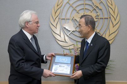 Russian Representative Presents Secretary-General with UN Flag Flown into Space