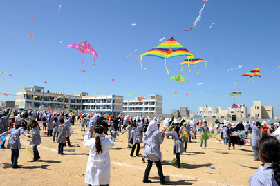 Palestinian Children Fly Kites on One-Year Anniversary of Japanese Quake