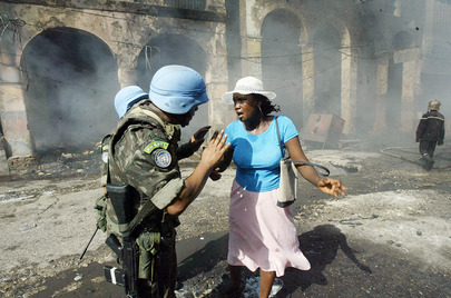 MINUSTAH Peacekeepers Help Street Merchant in Port-Au-Prince