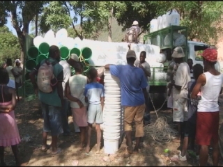 Selected frame from video story 
HAITI / WATER BUCKETS
	